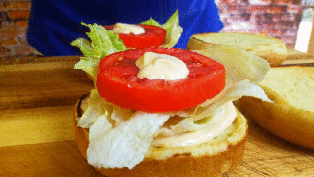 A pinch of salt goes on top of the tomato slice