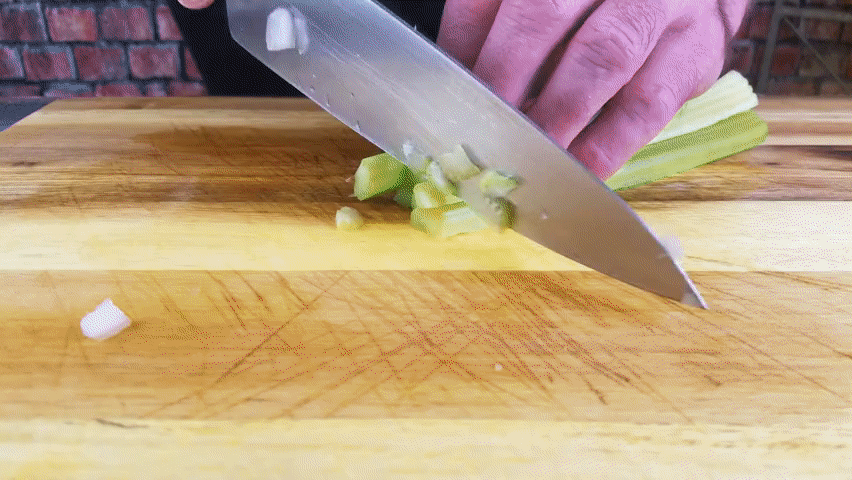 dicing celery, apples, onions and parsly