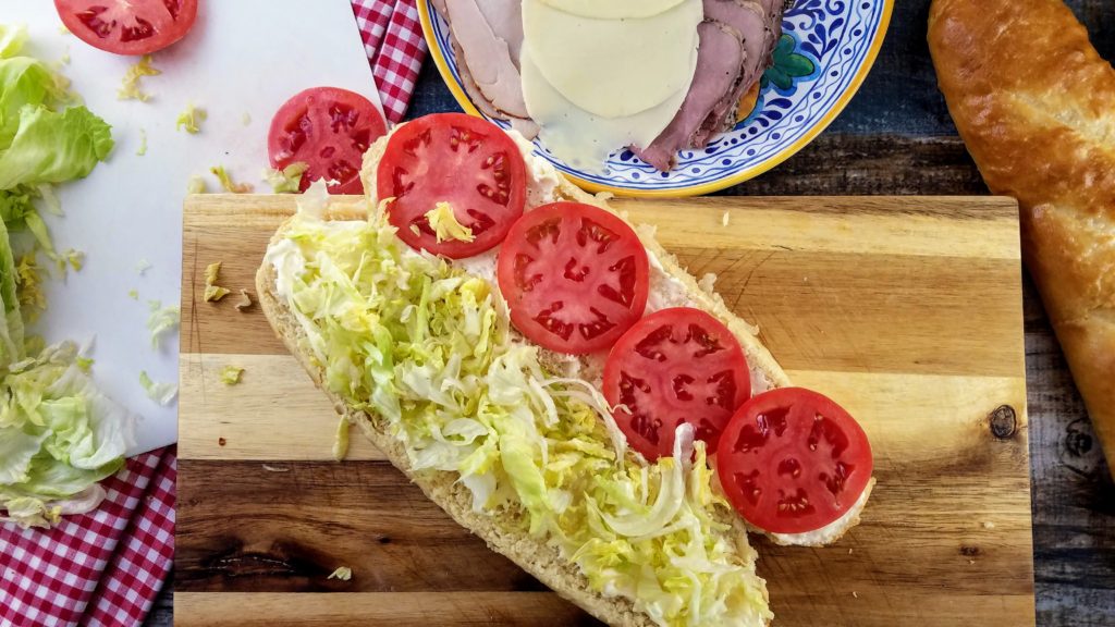 french sub roll with lettuce tomato and mayo