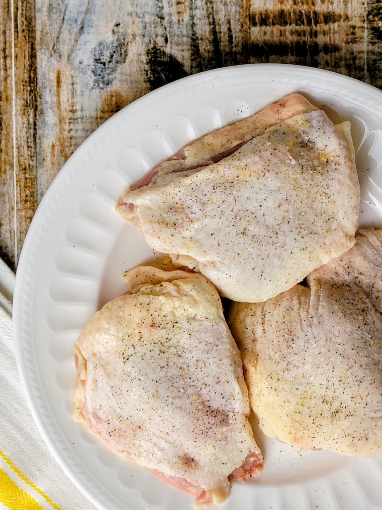Chicken thighs with salt and pepper